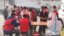 宁武县妇联干部下沉社区开展疫情防控志愿服务活动