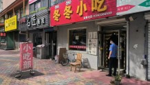 延吉市城管局清理违规灯箱广告牌提升城市文明形象
