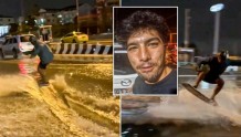 泰国遭洪水侵袭 男子却在街头积水中玩滑板