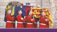 英女王伊丽莎白二世葬礼昨举行 约2000人出席仪式 大量民众在伦敦街头悼念